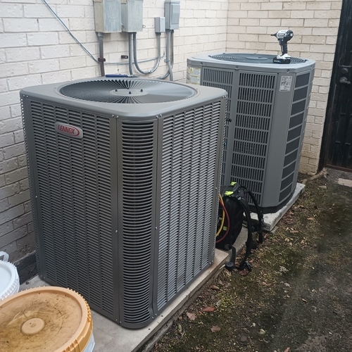 pair of air conditioning units